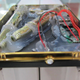 Illustration for article titled Duped Shopper Gets HDD Filled with Stupid Glue and Other Worthless Crap